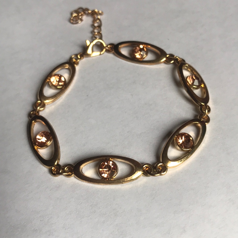 Copper colored bracelet with diamond studs